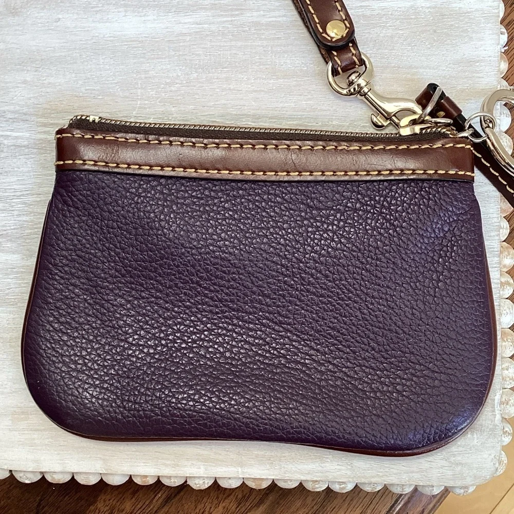 Dooney & Bourke pebbled deep purple and Brown Leather Wristlet, keychain